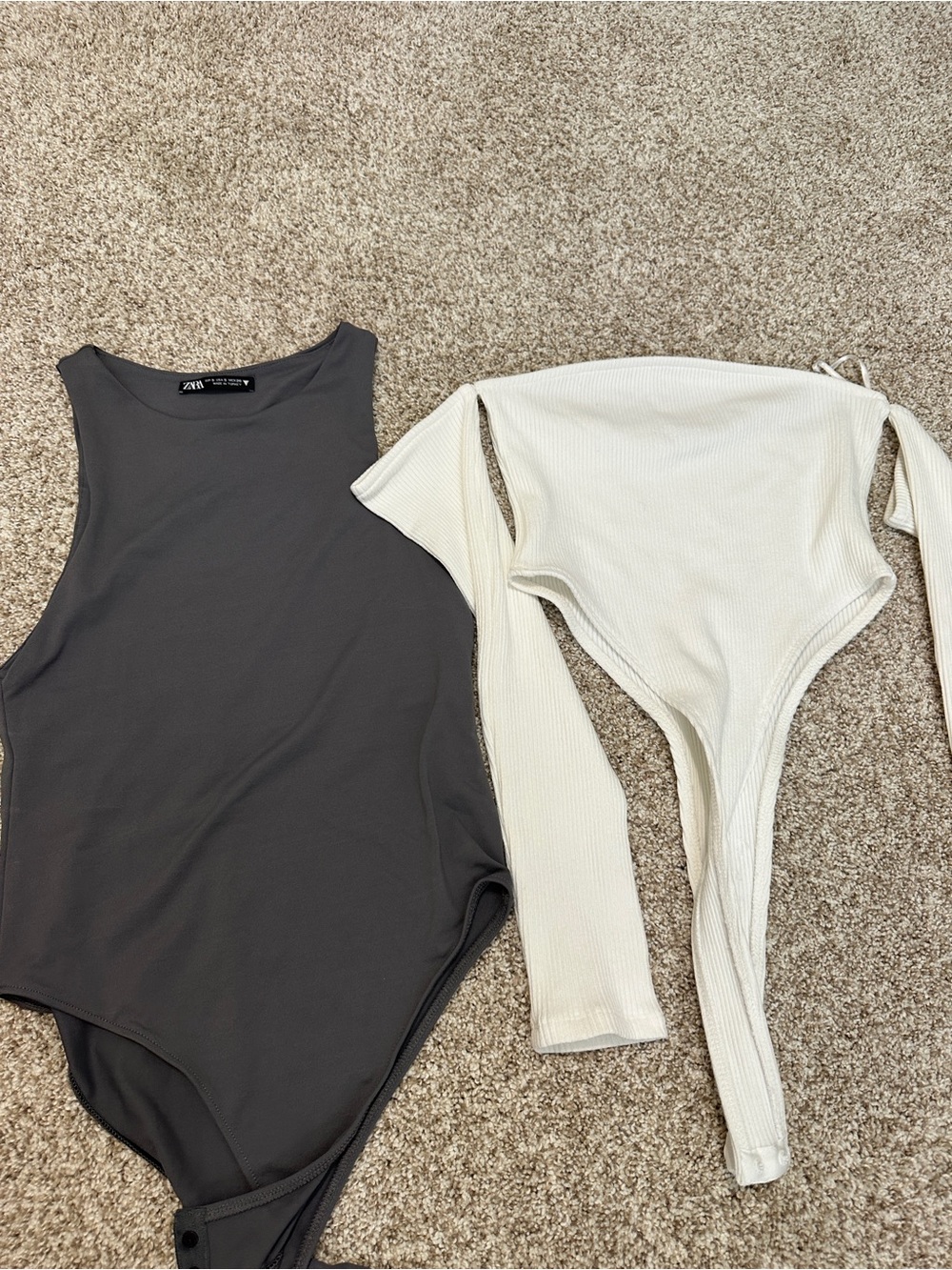 Zara charcoal gray sleeveless bodysuit + off-white ribbed long sleeve bodysuit